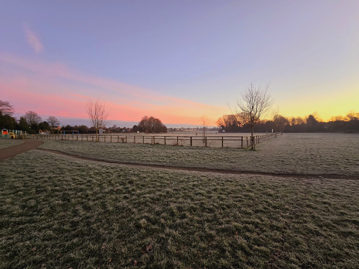Sheldon Country Park at winter sunrise — frost-covered meadows and paddock fencing